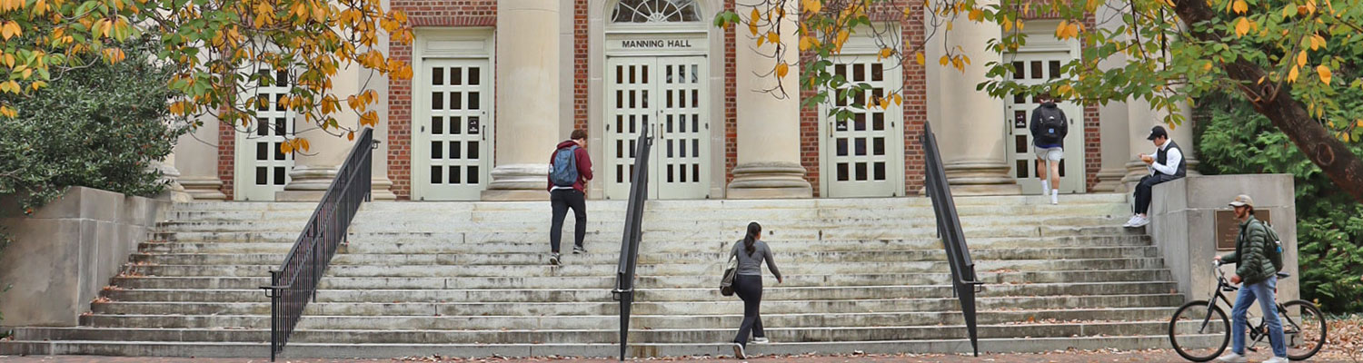 Students walking up steps to Manning Hall